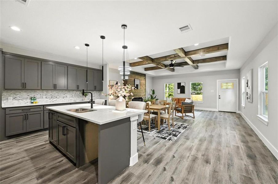 Kitchen with coffered ceiling, ceiling fan, beamed ceiling, backsplash, and pendant lighting Kitchen with coffered ceiling, ceiling fan, beamed ceiling, backsplash, and pendant lighting
