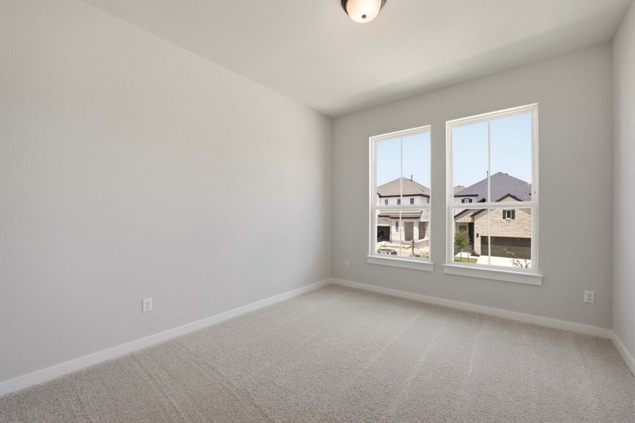 Spacious, unfurnished interior of a new home in Heritage, Dripping Springs (Image 33).