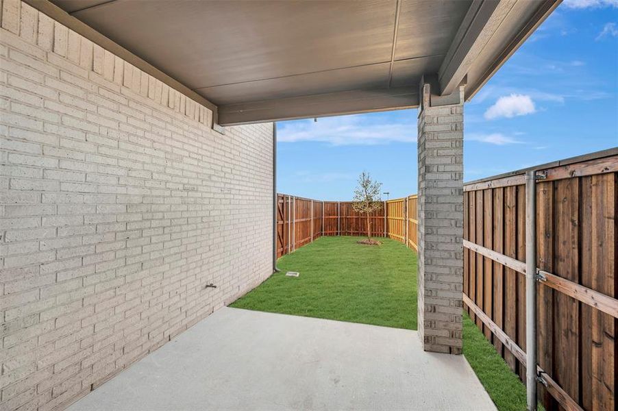 Exterior details and patio area of a home in Lilybrooke at Legacy Hills, Celina (Image 23).