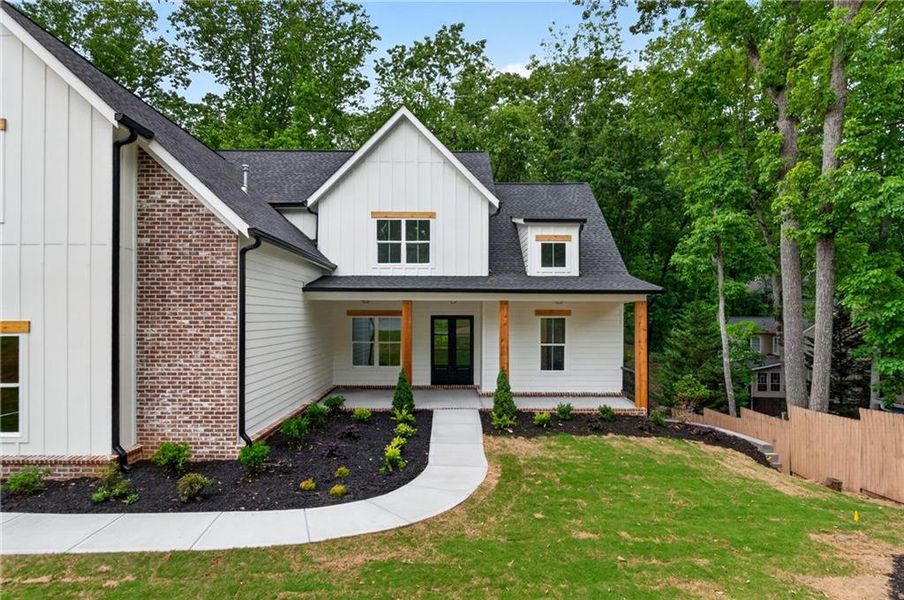 Front exterior of a new home in , Cumming, GA, highlighting curb appeal (Image 27).