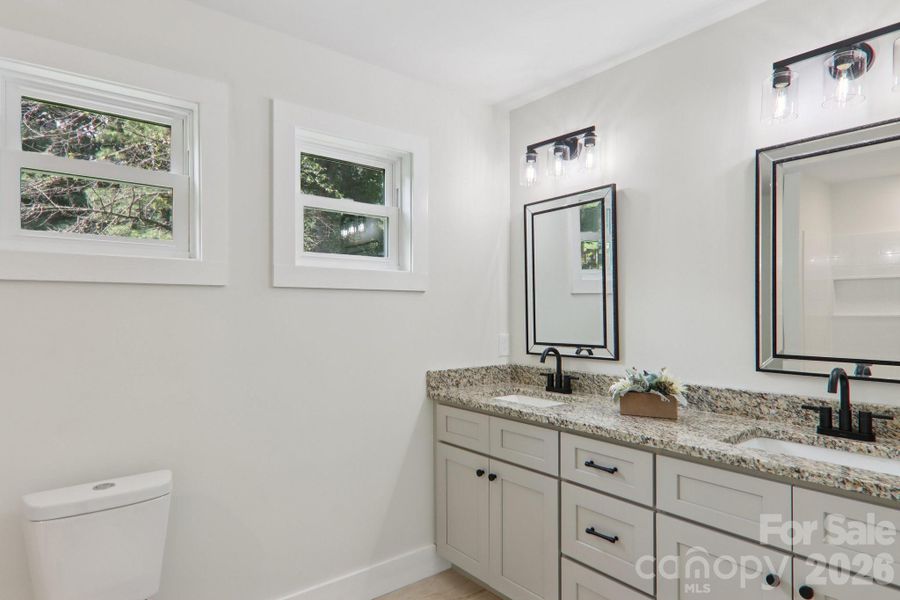 Furnished interior view inside a new home in , Waynesville (Image 9).