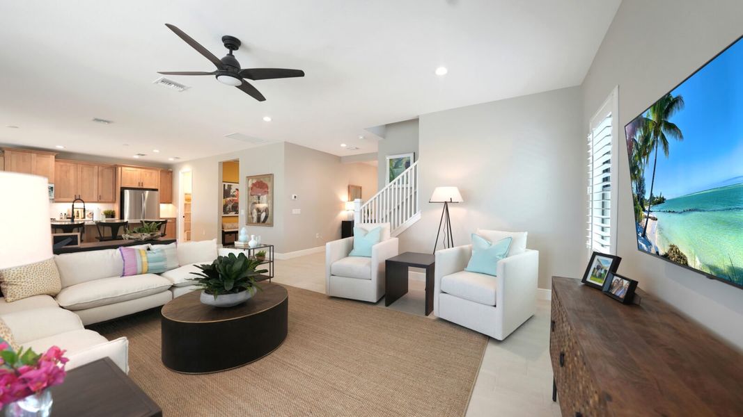 Representative furnished interior of a home built from the Artistry by Neal Communities in SkySail, Naples (Image 7).