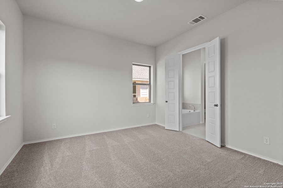 Spacious, unfurnished interior of a new home in Megan's Landing, Castroville (Image 18).