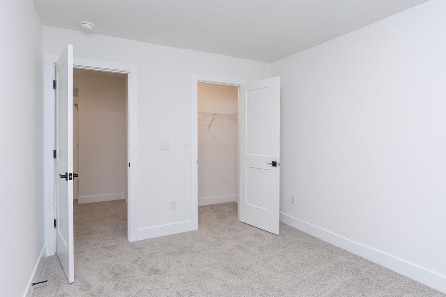 Representative unfurnished interior of a home built from the 1692 Townhome by Adams Homes in Parkstone Place Townhomes, Roebuck (Image 25).
