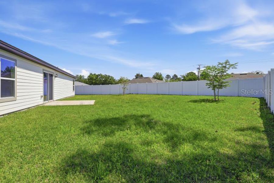 Exterior details and patio area of a home in Palm Coast, Palm Coast (Image 4).