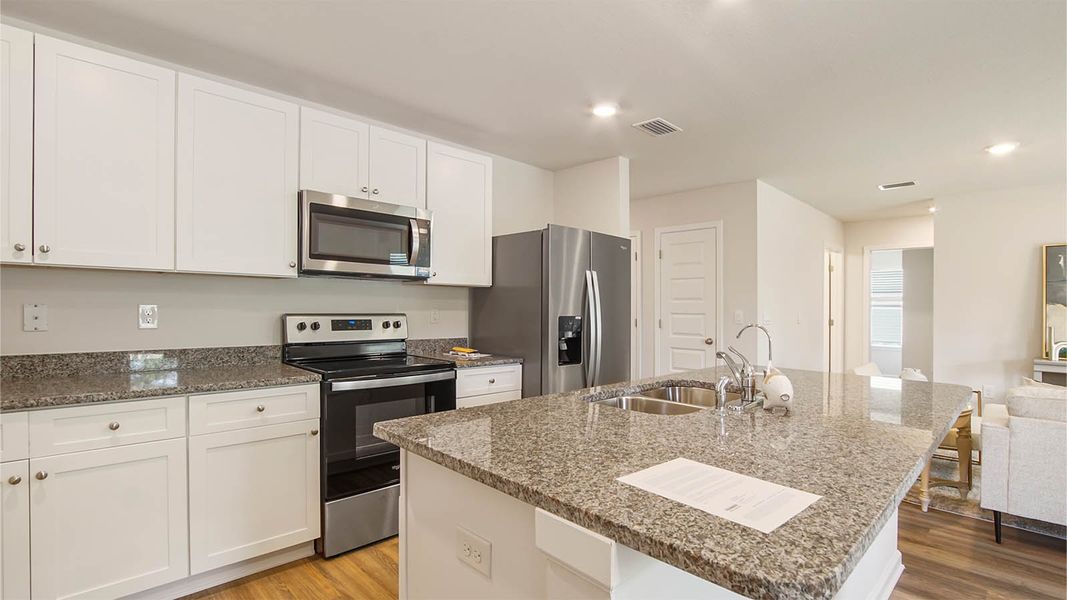 Representative furnished interior of a home built from the Aldridge by D.R. Horton in Sunny Hills, Chipley (Image 8).