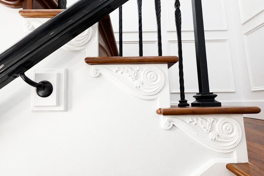 Intricate staircase scrollwork and detai