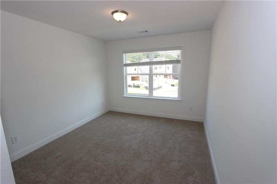 Spacious, unfurnished interior of a new home in Clark Farms, Flowery Branch (Image 24).