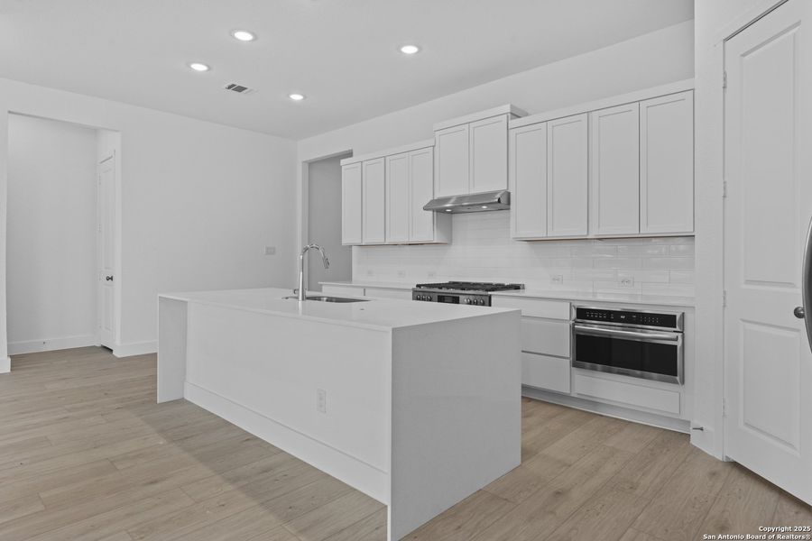Furnished interior view inside a new home in , New Braunfels (Image 5).