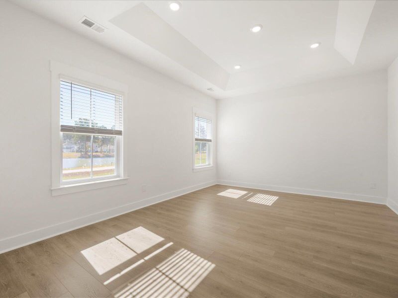 Spacious, unfurnished interior of a new home in The Coves at Lakes of Cane Bay II, Summerville (Image 23). Spacious, unfurnished interior of a new home in The Coves at Lakes of Cane Bay II, Summerville (Image 23).