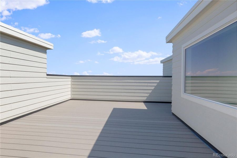 Front exterior of a new home in Dillon Pointe - Skyview, Broomfield, CO, highlighting curb appeal (Image 2).