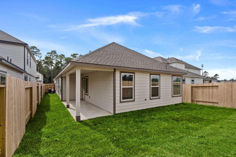 Exterior details and patio area of a home in Cypresswood Landing, Humble (Image 4).