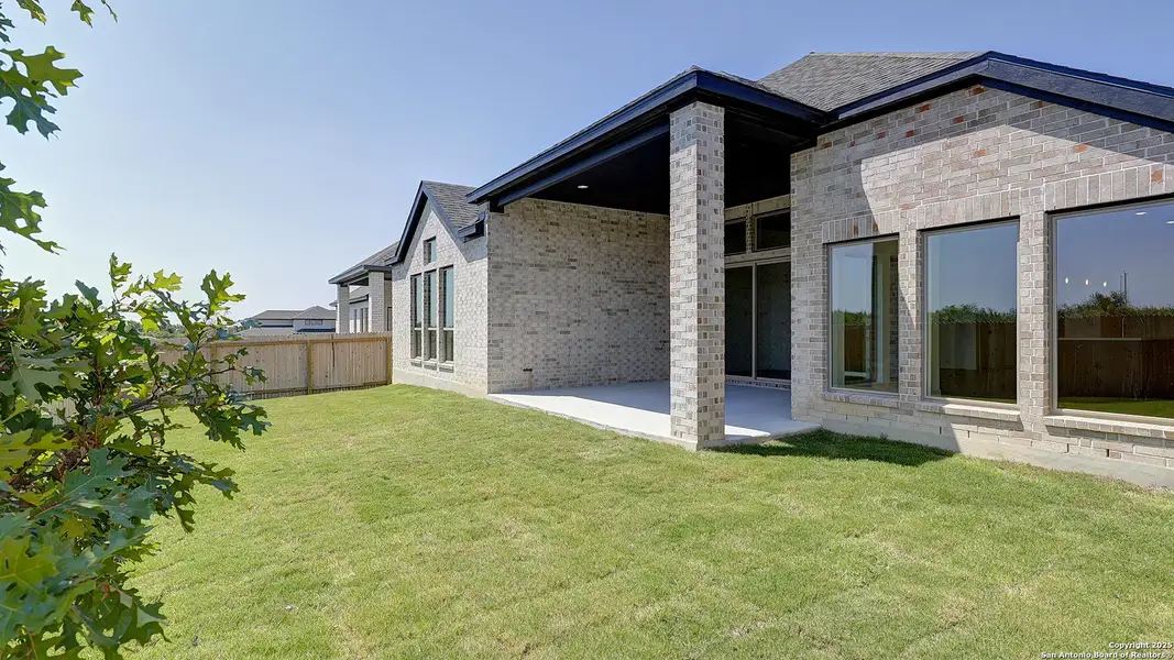 Front exterior of a new home in Kallison Ranch 60', San Antonio, TX, highlighting curb appeal (Image 1).