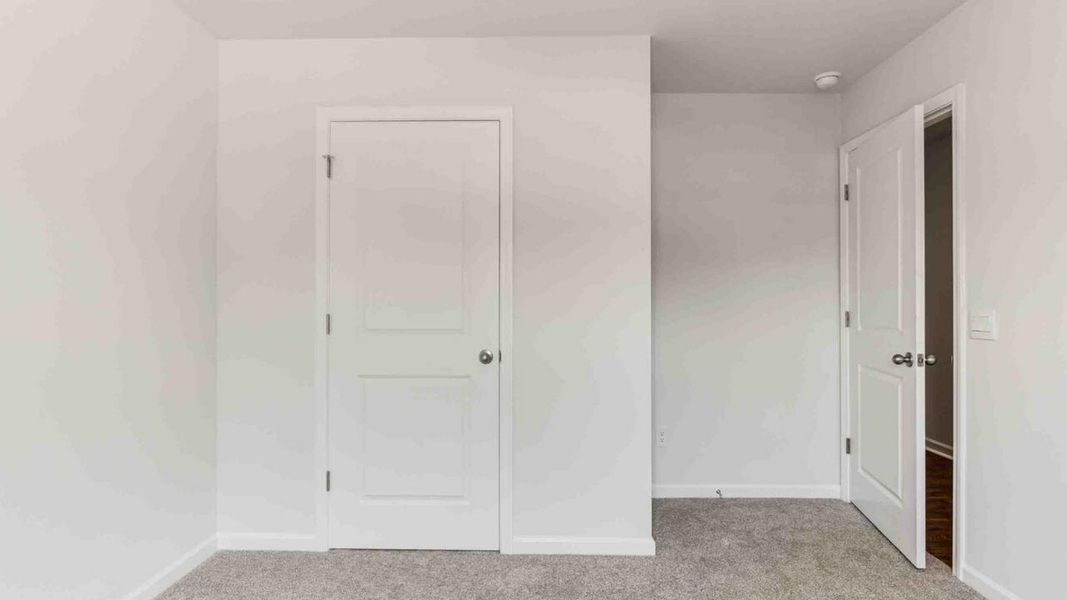 Representative unfurnished interior of a home built from the Devon by D.R. Horton in Eagle Creek, Bolivia (Image 20).