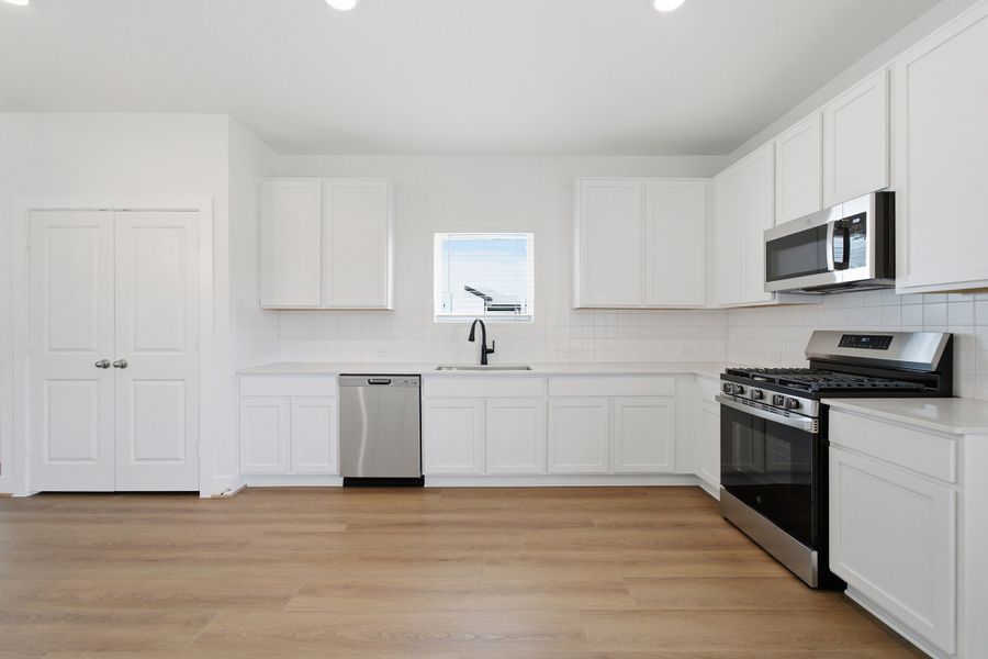 Furnished interior view inside a new home in Sunfield, Buda (Image 9).