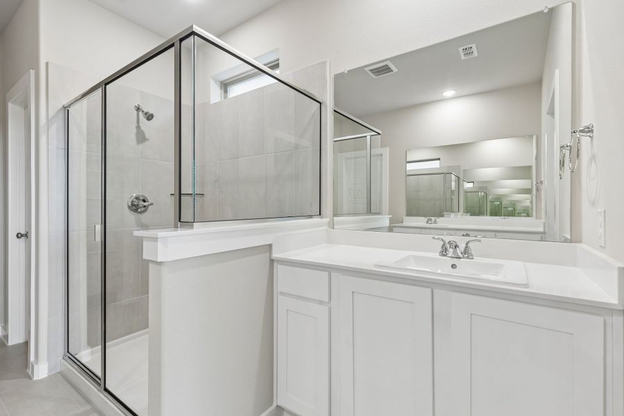 Primary Bathroom in the Winters home plan by Trophy Signature Homes – REPRESENTATIVE PHOTO