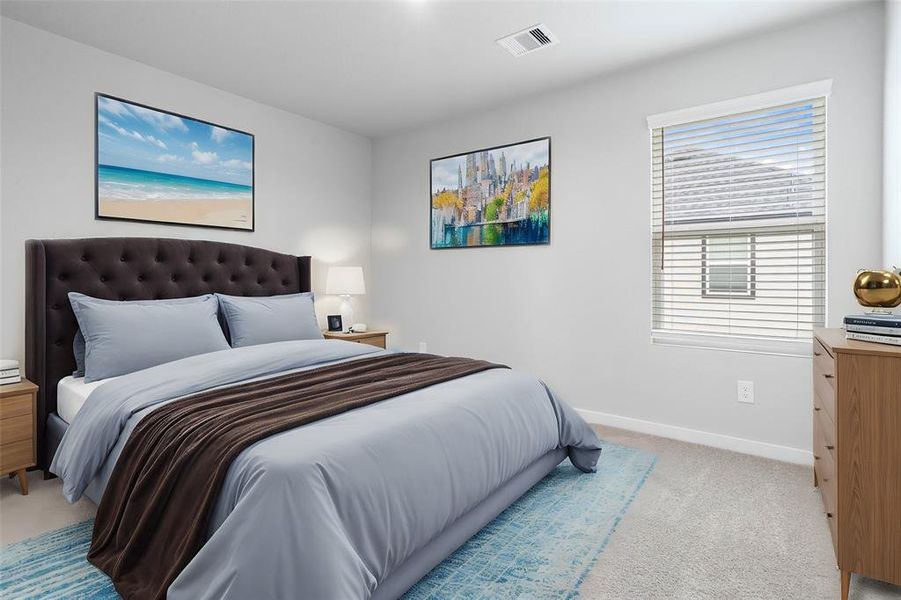 Secondary bedroom features plush carpet, custom paint, lighting, and large window with privacy blinds.