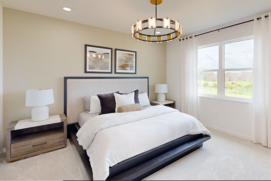 Representative furnished interior of a home built from the Tiller by Homes by Towne in Shellstone at Waterside, Sarasota (Image 9).