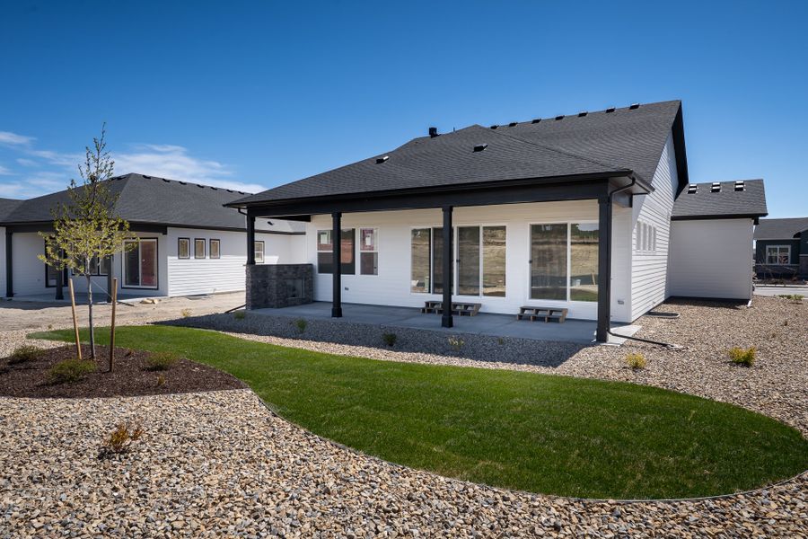 Exterior details and patio area of a home in Wolf Ranch - Enclave Collection, Colorado Springs (Image 3).