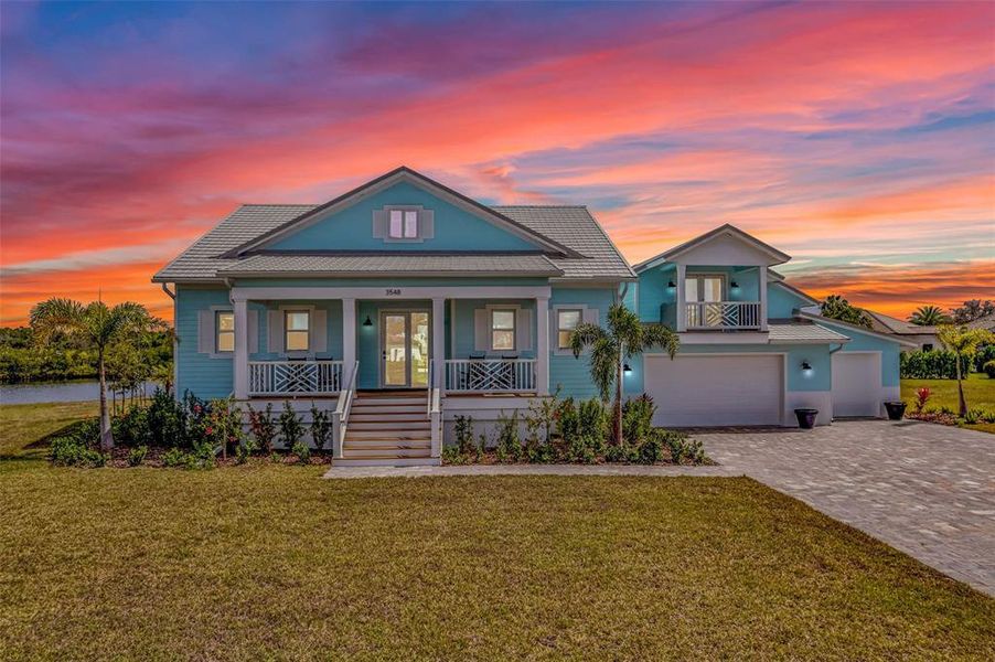 Front exterior of a new home in , Punta Gorda, FL, highlighting curb appeal (Image 23).