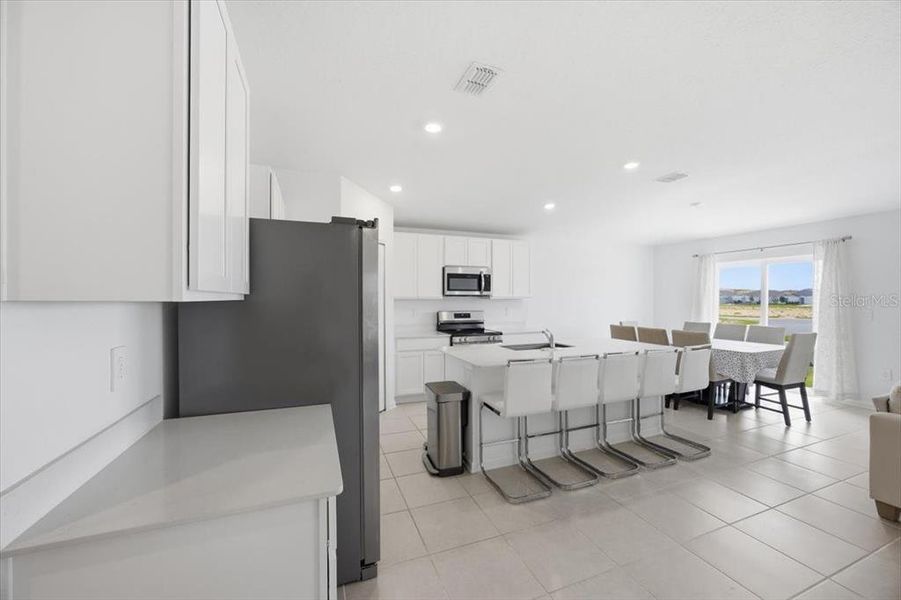 Furnished interior view inside a new home in Hunt Club Groves, Lake Wales (Image 23).