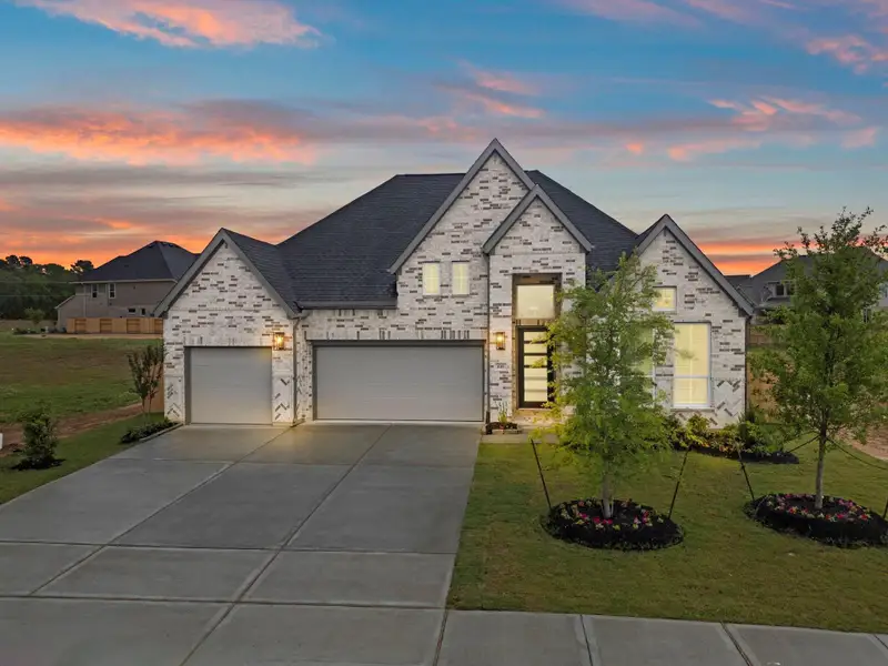 Front exterior of a new home in Briarley, Montgomery, TX, highlighting curb appeal (Image 25).