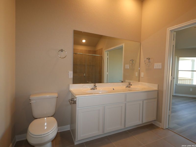 Furnished interior view inside a new home in Hickory Ridge, Elmendorf (Image 16).