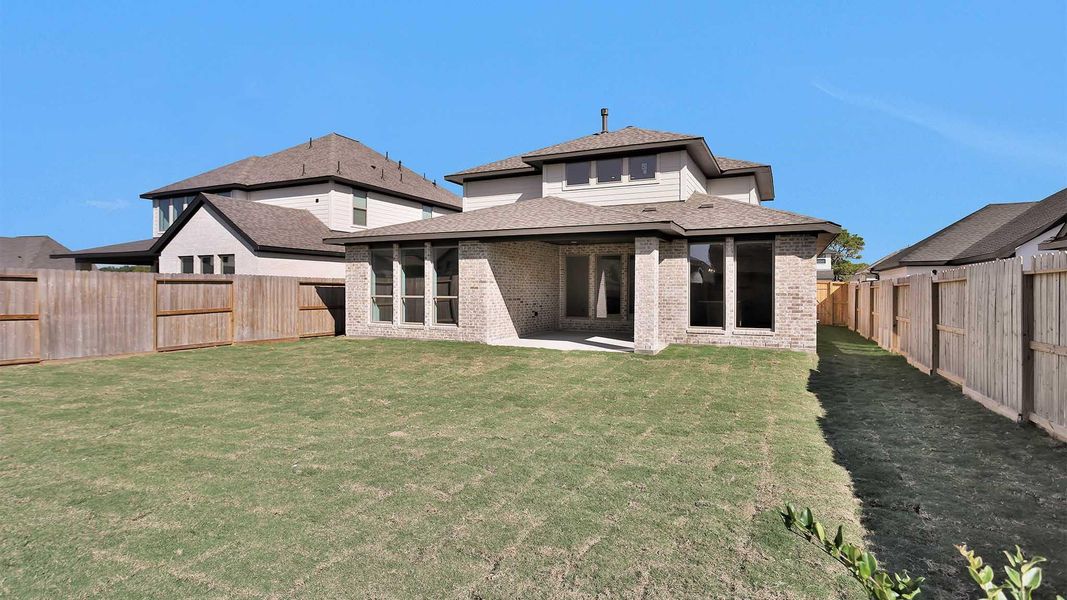 Exterior details and patio area of a home in Candela South 50', Richmond (Image 3).