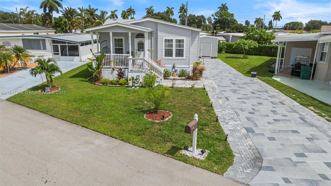 Front exterior of a new home in , Davie, FL, highlighting curb appeal (Image 20).