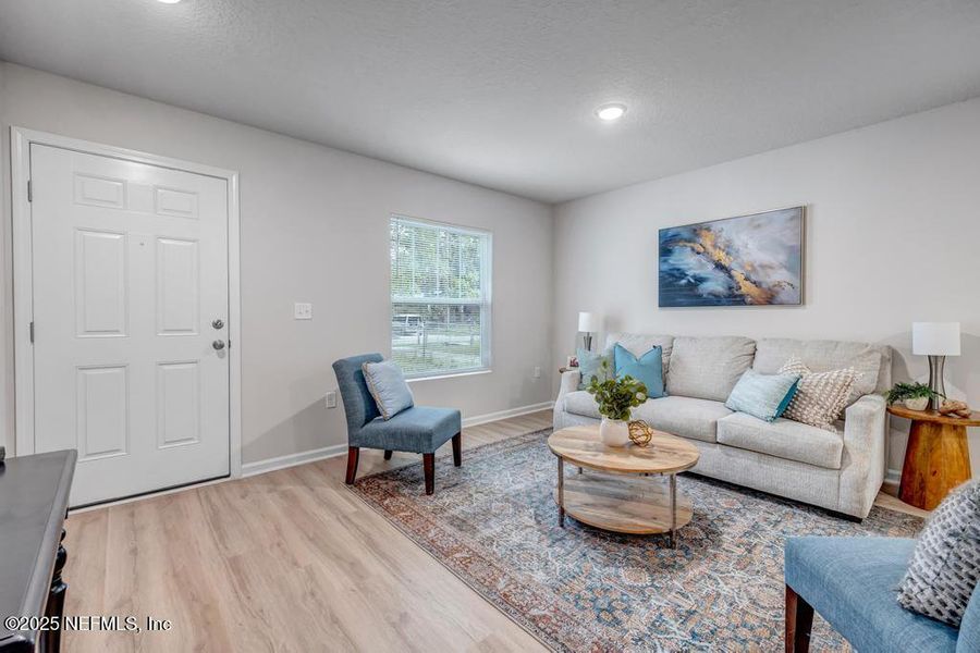 Furnished interior view inside a new home in , Jacksonville (Image 1).