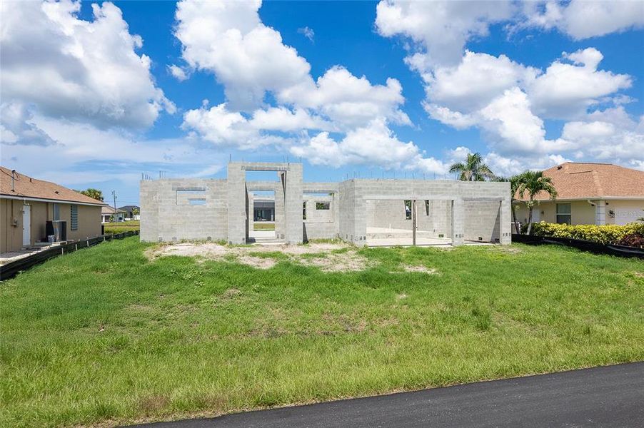 Front exterior of a new home in , Rotonda West, FL, highlighting curb appeal (Image 19).