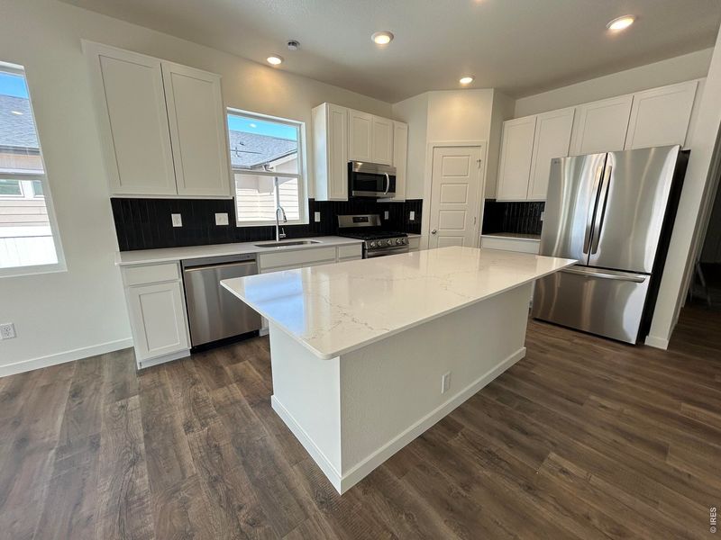 Furnished interior view inside a new home in Union Colony West, Greeley (Image 5).