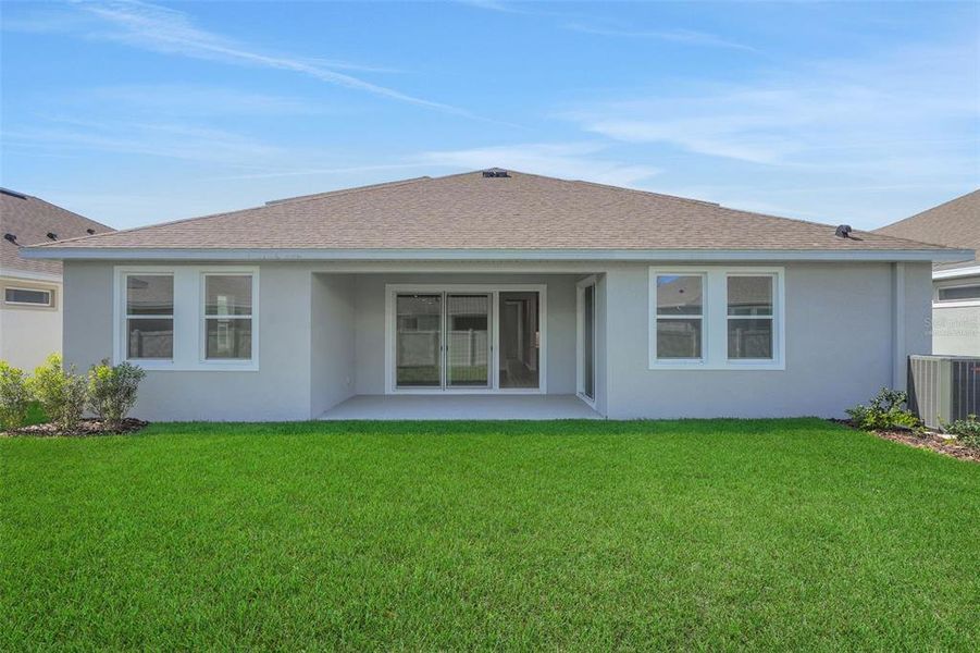 Exterior details and patio area of a home in Angeline, Land O' Lakes (Image 4).