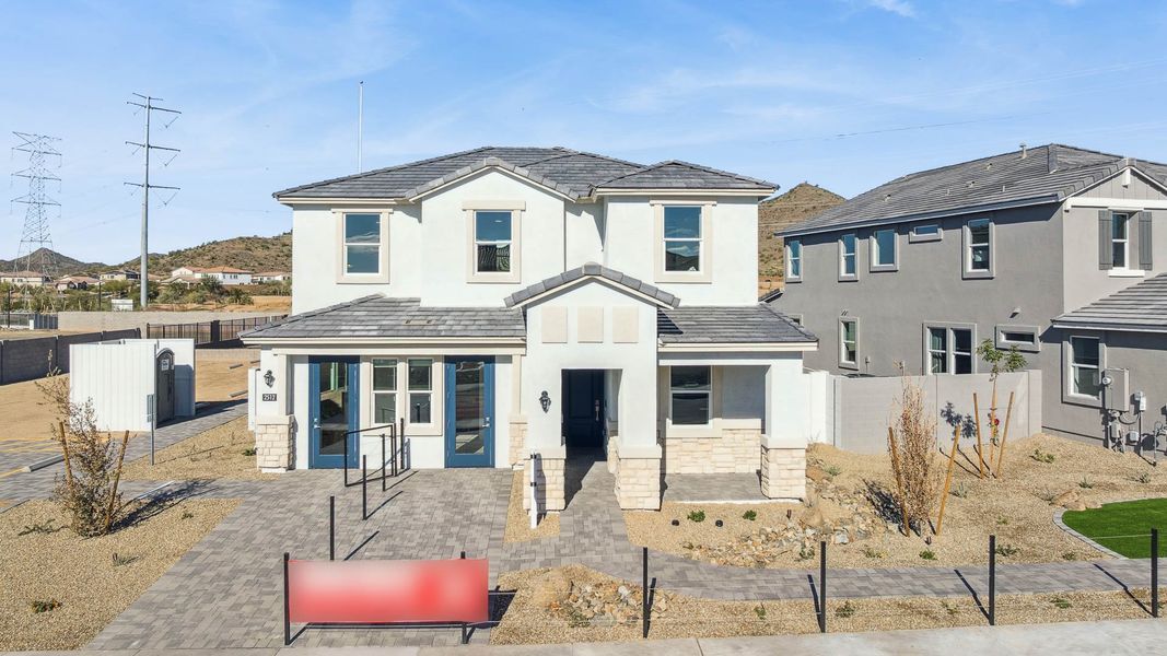 Representative exterior photo of a completed home built from the Apache by D.R. Horton in The Ridge at Stone Butte, Phoenix, AZ (Image 28).