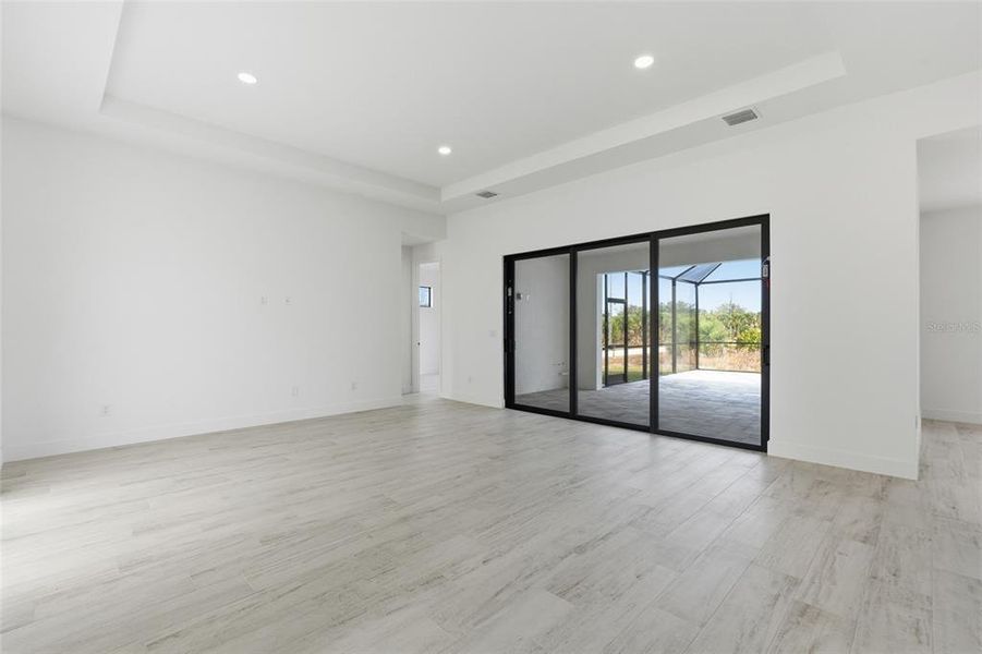 Spacious, unfurnished interior of a new home in , Port Charlotte (Image 42).