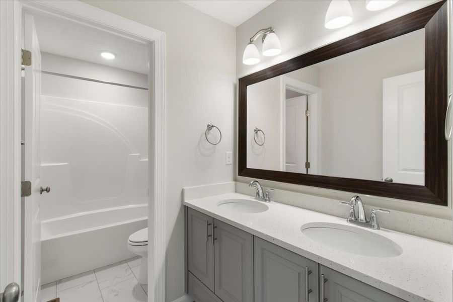 Secondary Bathroom | 6244 Canterbury Farms Pkwy by Ivey Homes