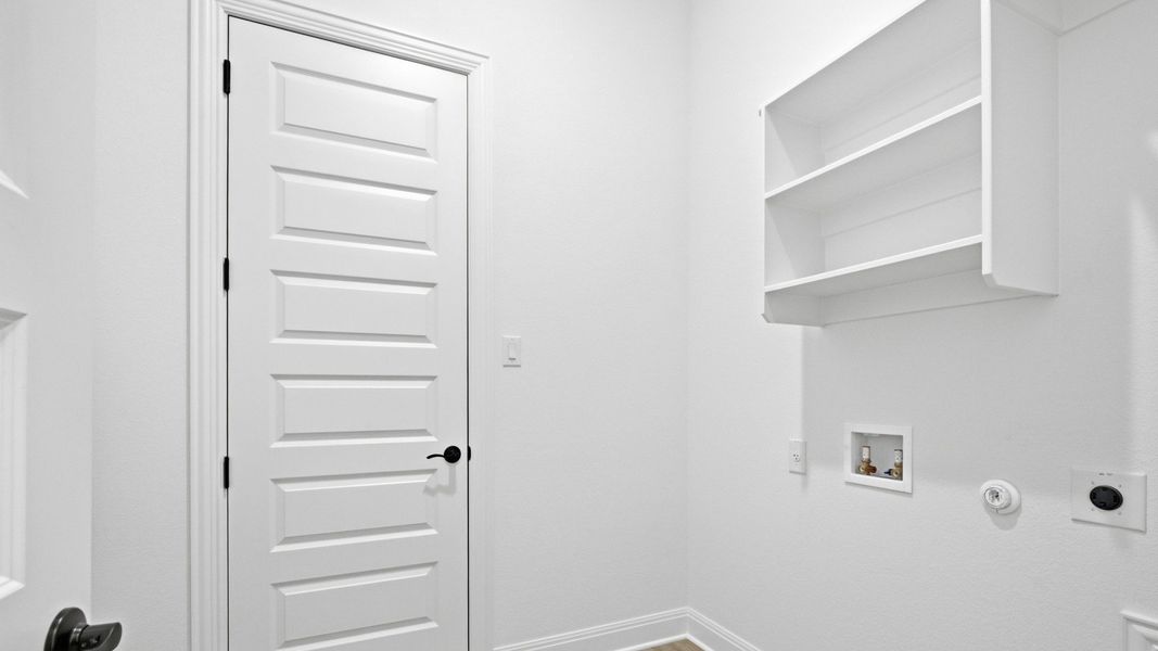 Furnished interior view inside a new home in Oaks at San Gabriel, Georgetown (Image 11).