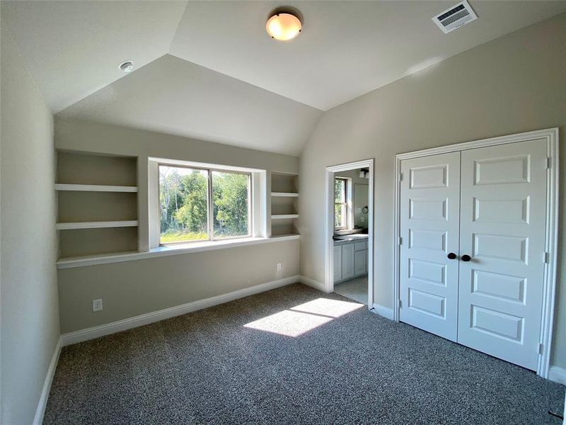 Bed #3 with built-in shelves & vaulted ceiling Bed #3 with built-in shelves & vaulted ceiling
