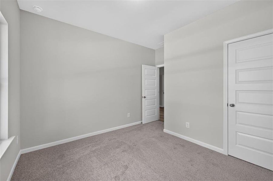 Spacious, unfurnished interior of a new home in Summerfield Place, Carrollton (Image 14).