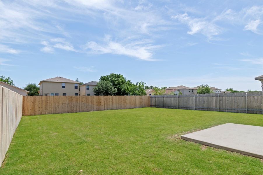 View of yard featuring a patio area and a residential view
