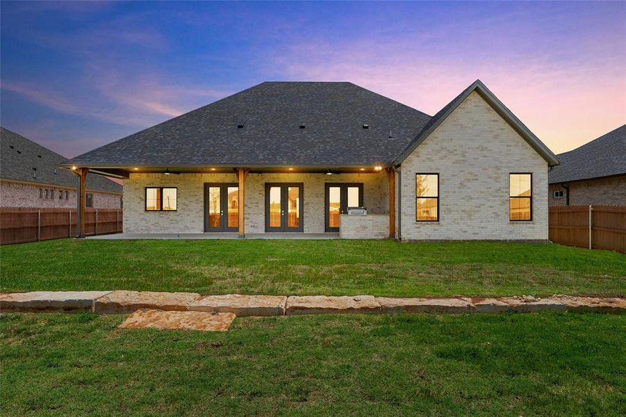 Exterior details and patio area of a home in , Hewitt (Image 26).