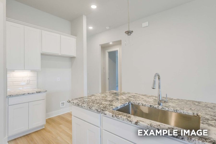 Image 31 representing the The Luna by Davidson Homes LLC in Sunterra, Katy, TX.