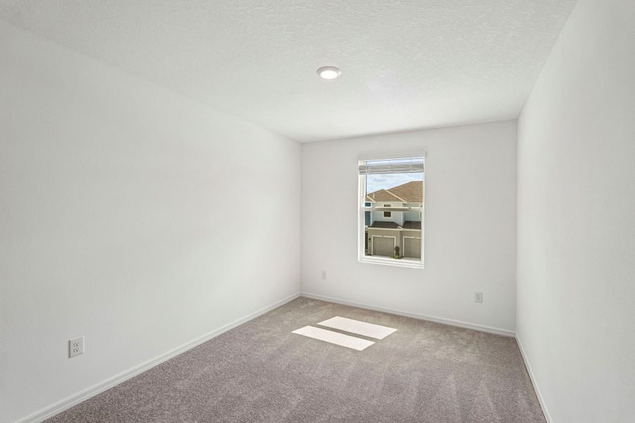 Spacious, unfurnished interior of a new home in The Towns at Tiburon, Nokomis (Image 11).