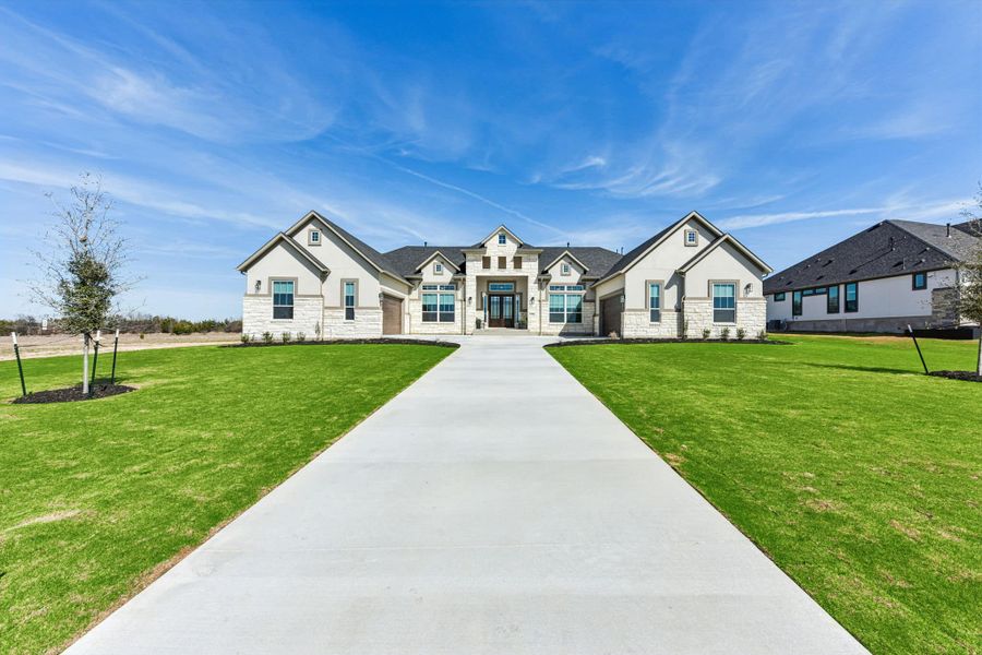 Front exterior of a new home in Feathergrass, Florence, TX, highlighting curb appeal (Image 31).