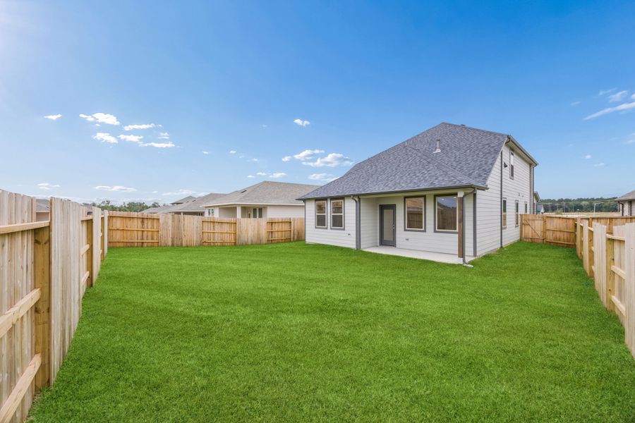Exterior details and patio area of a home in Riviera Pines, Huffman (Image 29).