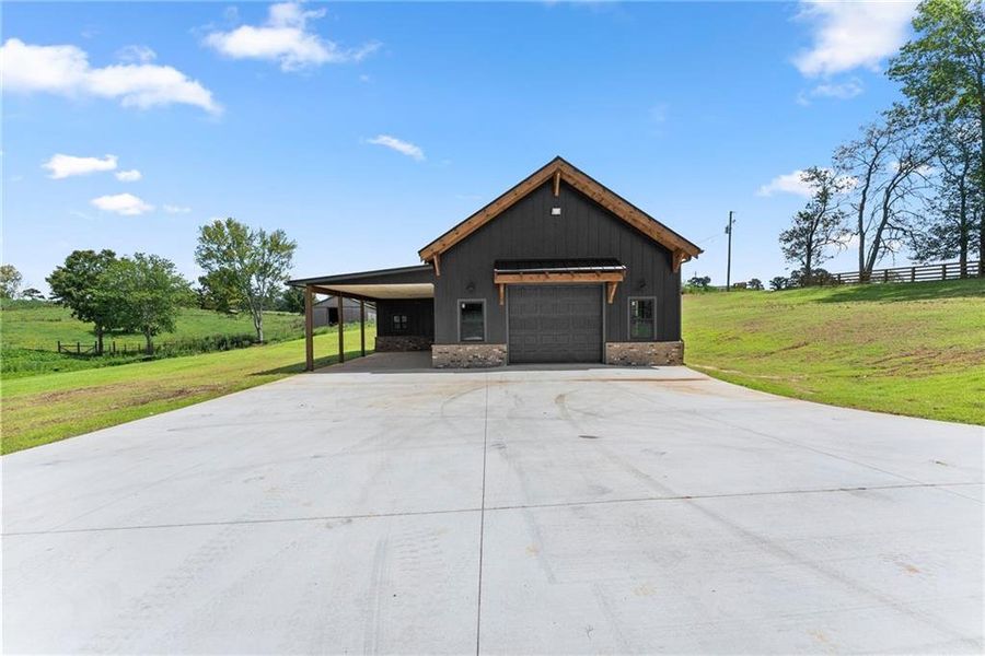 Front exterior of a new home in , Clermont, GA, highlighting curb appeal (Image 37). Front exterior of a new home in , Clermont, GA, highlighting curb appeal (Image 37).