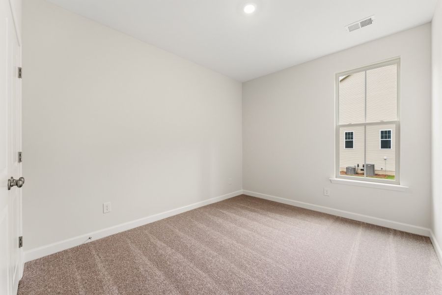 Spacious, unfurnished interior of a new home in Landing at Pine Lake, Anderson (Image 31).