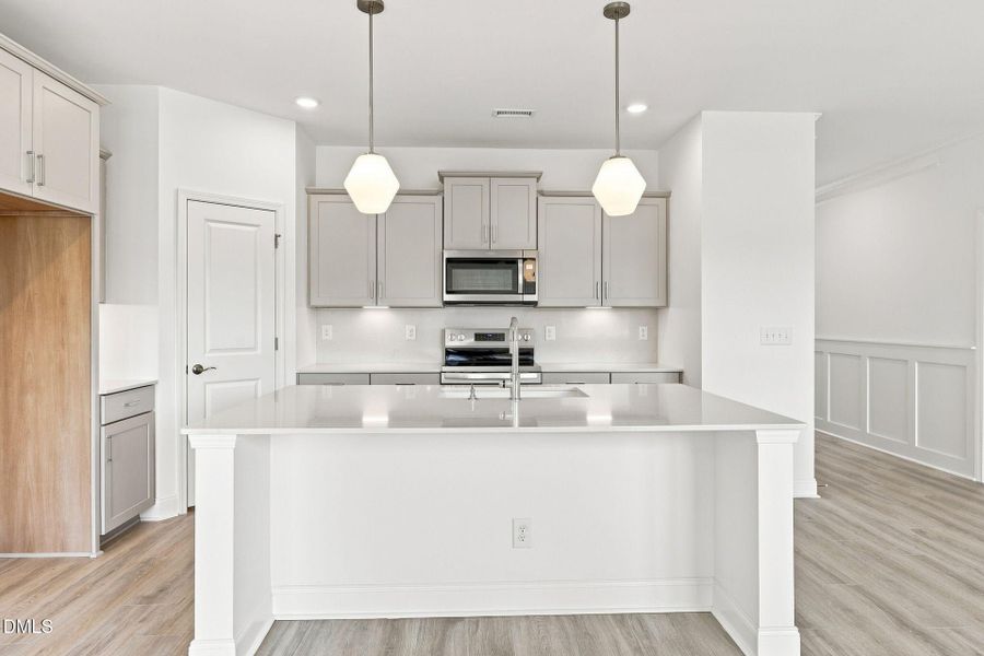 Furnished interior view inside a new home in The Cottages at 78 North, Sanford (Image 9).