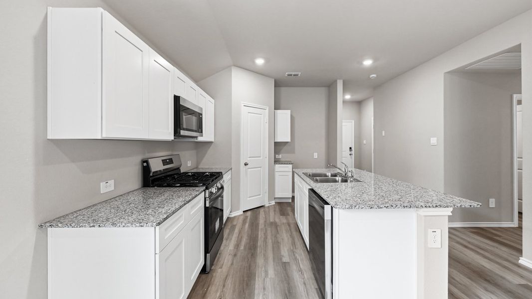 Representative furnished interior of a home built from the Dalton by D.R. Horton in Rock Creek West, Fort Worth (Image 8).