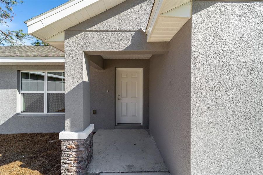 Front exterior of a new home in , Citrus Springs, FL, highlighting curb appeal (Image 2). Front exterior of a new home in , Citrus Springs, FL, highlighting curb appeal (Image 2).